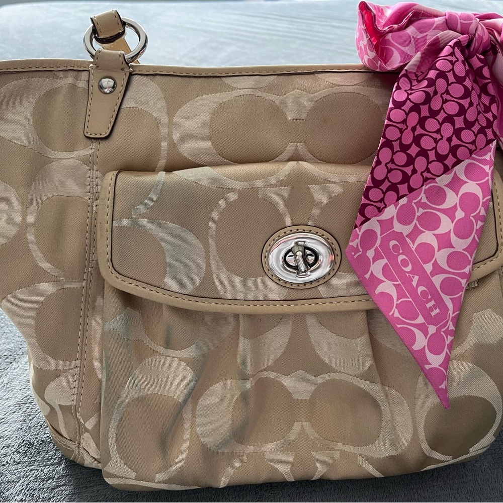 Coach handbag. Slightly used with pink scarf.